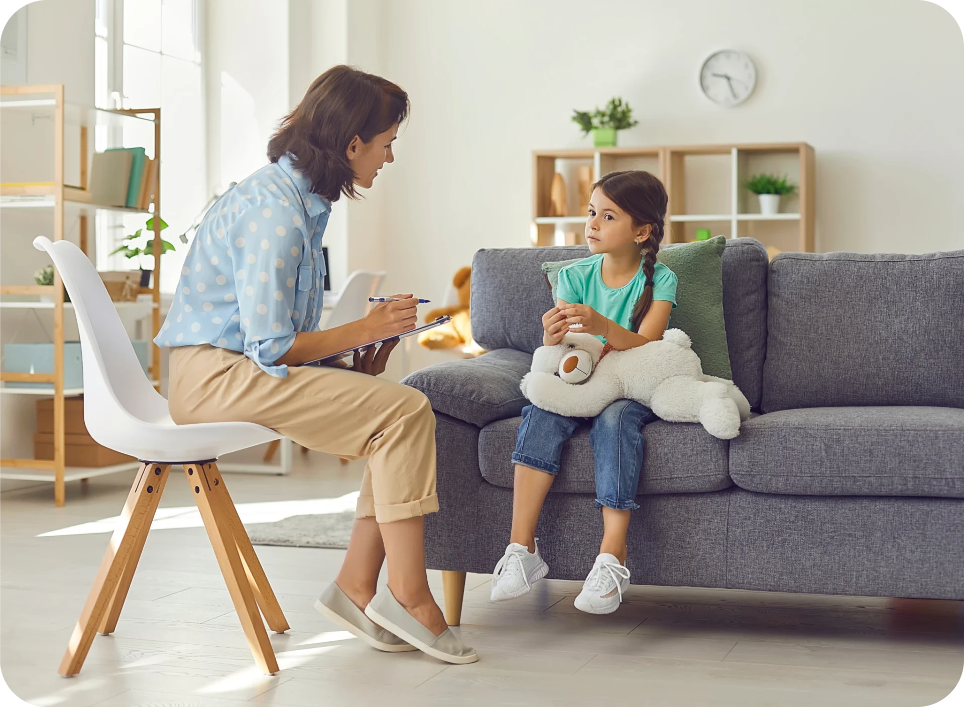 Sitting and chatting with a teddy bear