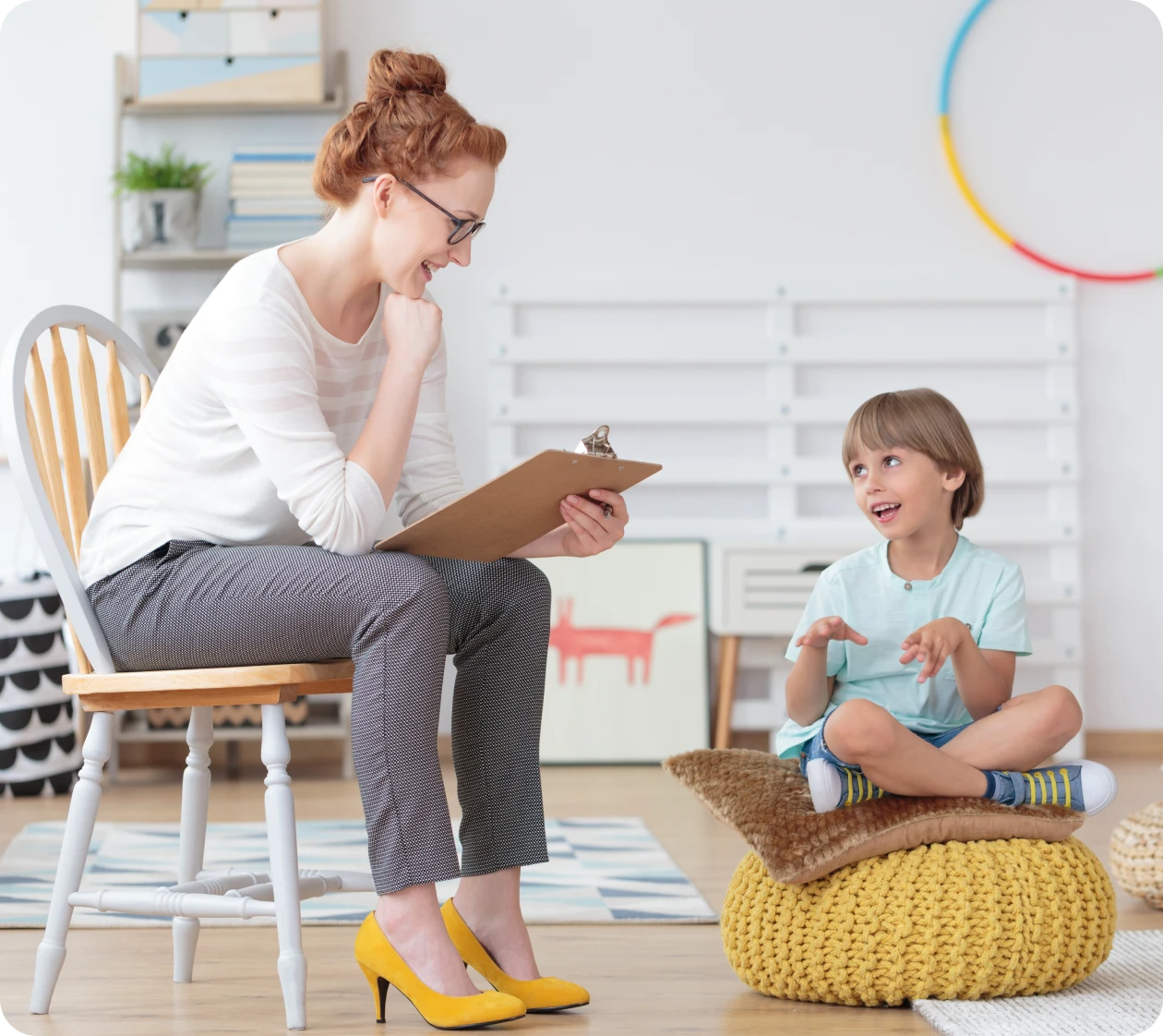 Therapist and child in discussion